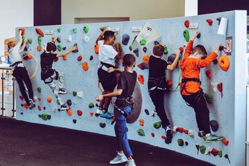 Kids climbing a wall